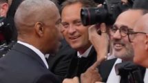Denzel Washington discute con fotógrafo Cannes 2025