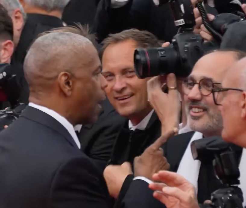 Denzel Washington discute con fotógrafo Cannes 2025